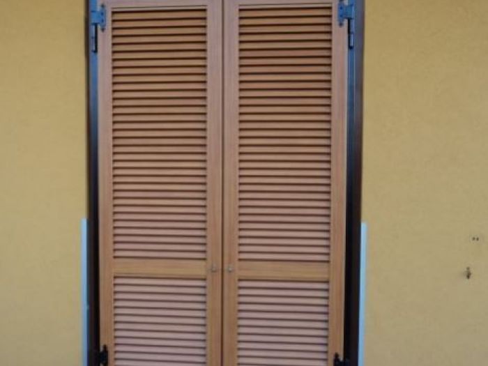 Archisio - Porte Basculanti Bonetalli Maurizio - Progetto Infissi