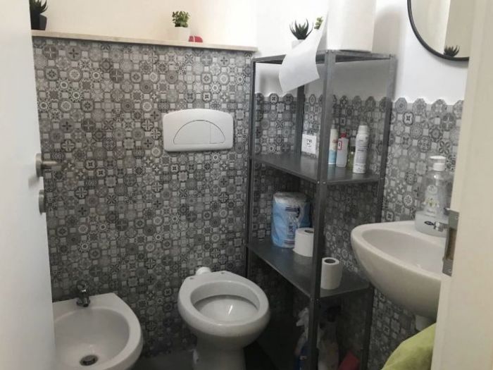 Archisio - Riana Re srl - Progetto Ristrutturazione negozio quartiere montesacro