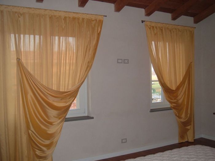 Archisio - Pezzoni Tappezzeria Tendaggi - Progetto Tende