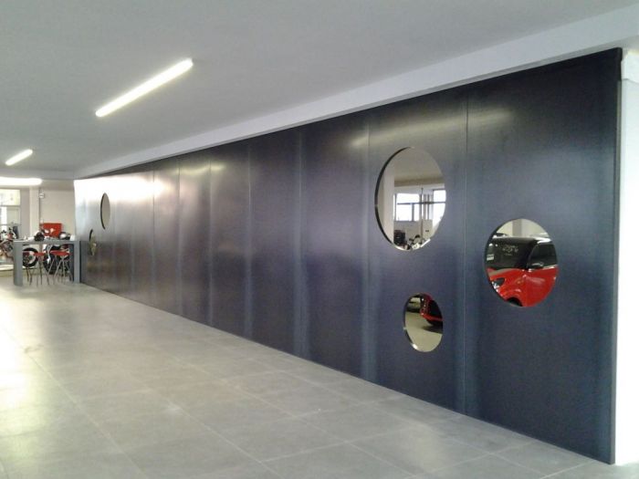 Archisio - Bravo Servizi Aziendali Di Bravo Maurino - Progetto Allestimento interno concessionaria