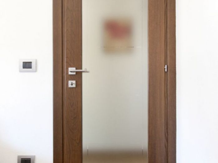 Archisio - Falegnameria Serra Figli - Progetto Lavorazioni in legno in stile moderno