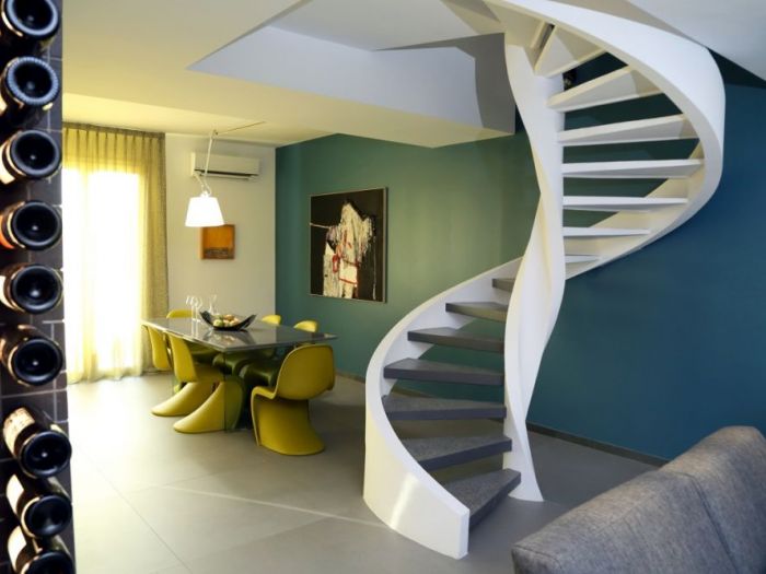 Archisio - Pierfrancesco Arnone - Progetto Progetto di ristrutturazione di un immobile su 2 livelli sviluppato per una coppia giovane abituata a viaggiare in giro per il mondo capace di fondere stili e idee