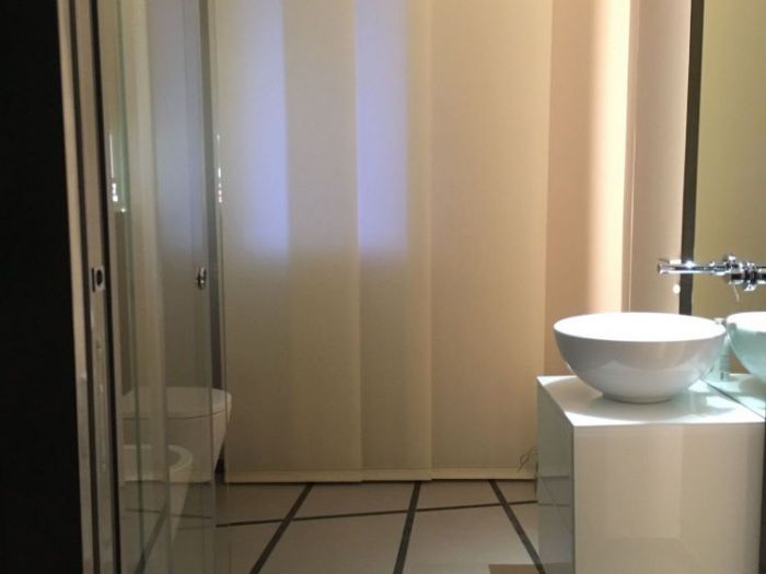 Archisio - Pierfrancesco Arnone - Progetto Progetto di ristrutturazione di un immobile su 2 livelli sviluppato per una coppia giovane abituata a viaggiare in giro per il mondo capace di fondere stili e idee