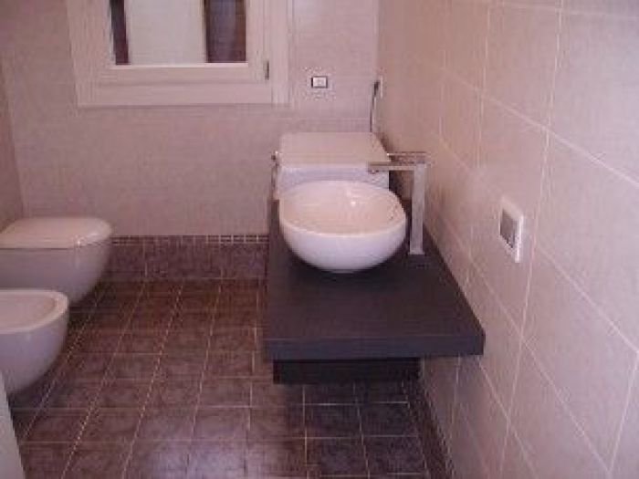 Archisio - Space Contract - Progetto Rifacimento bagni