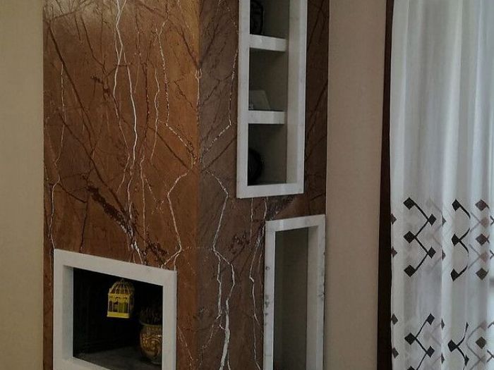 Archisio - Calabra Marmi - Progetto Camini