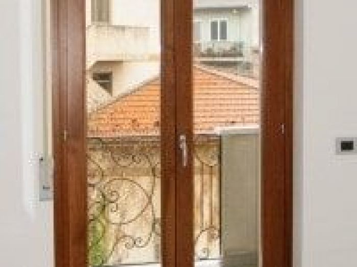 Archisio - Falegnameria Saderi - Progetto Infissi in legno