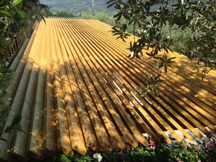 Archisio - Zanzotti Srls - Progetto Progettazione e realizzazione di pergolato a misura in legno lamellare in villa privata