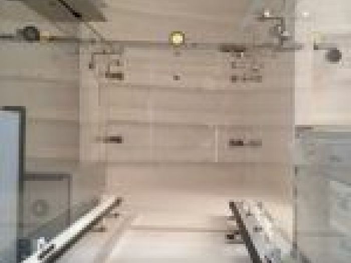 Archisio - Vetraria Loffredi - Progetto Ascensore in cristallo temperato con finestre in acciaio