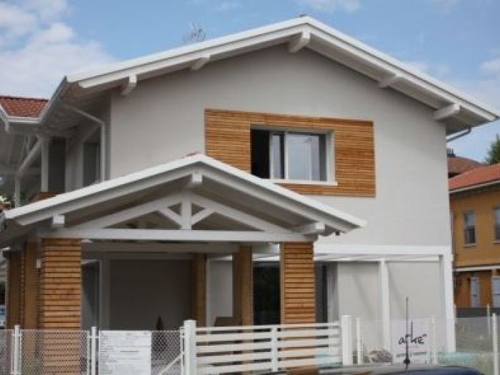 Archisio - Protek - Progetto Trifamiliare in legno a telaio passivo