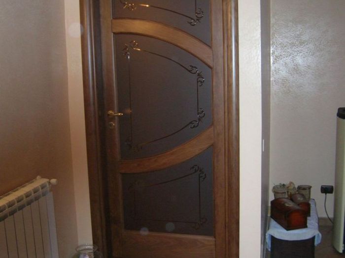 Archisio - Falegnameria Geo Snc - Progetto Porte portoni e cancelli