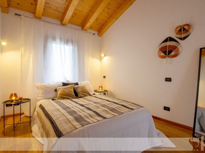 Archisio - Elisa Cattelan - Progetto Da una parete arancione ad uno stile etnic chic