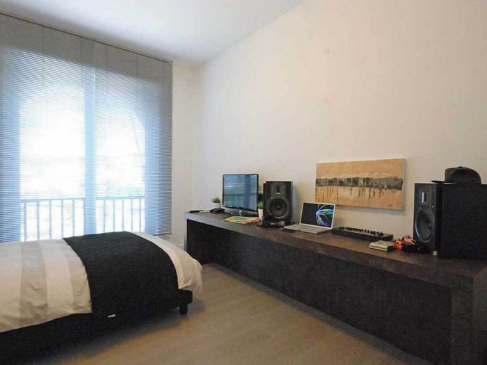 Archisio - Roberto Silvestri - Progetto Luce materiali spazio e una grande cucina