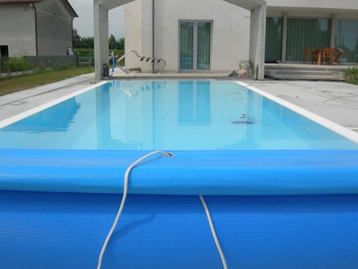 Archisio - Bertoli Piscine - Progetto Piscina bordo sfioratore