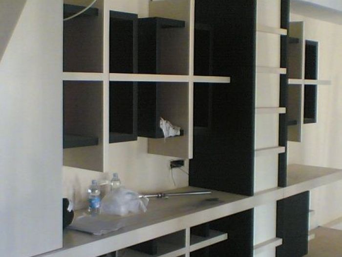 Archisio - Officinelegno - Progetto Locali commerciali