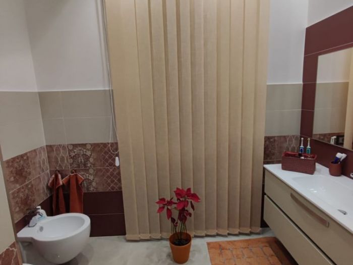 Archisio - Vincenzo Matarazzo - Progetto Ristrutturazione di una casa moderna con toni caldi ed accoglienti