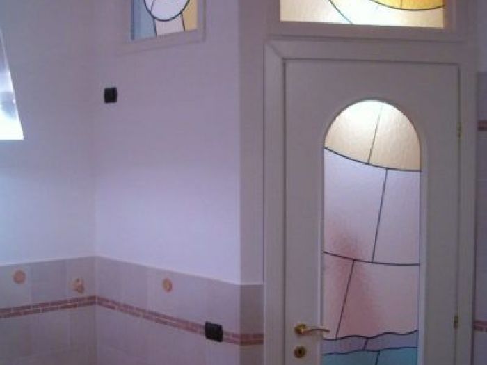 Archisio - Caleidos Creazioni Darte Snc - Progetto Vetrate per porte