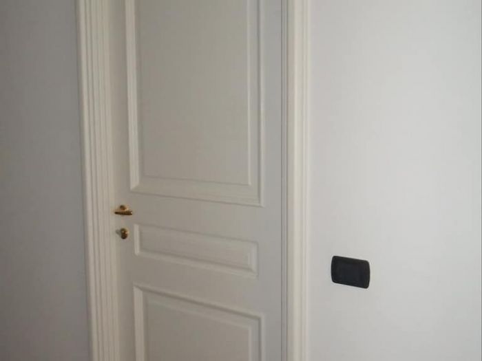 Archisio - Falegnameria Tuccitto - Progetto Porte in legno