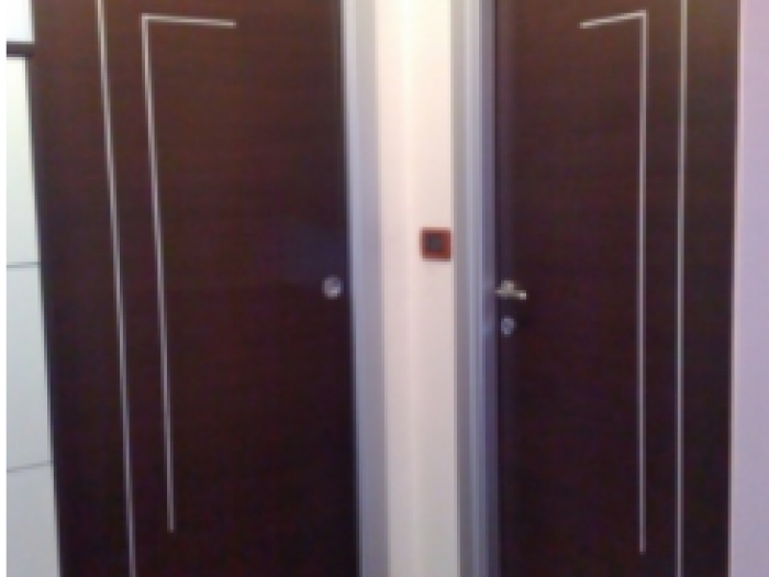 Archisio - De Siena Paolo Serramenti - Progetto Porte manigliere e accessori e controtelai