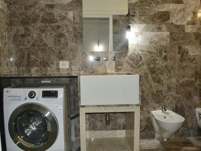 Archisio - Calabra Marmi - Progetto Bagni