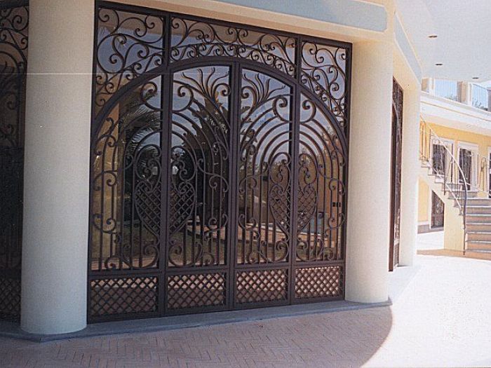 Archisio - Arte In Ferro Battuto Di Santo Marano - Progetto Portoni