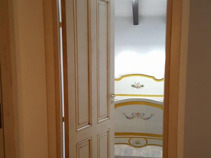 Archisio - Falegnameria Tuccitto - Progetto Porte in legno