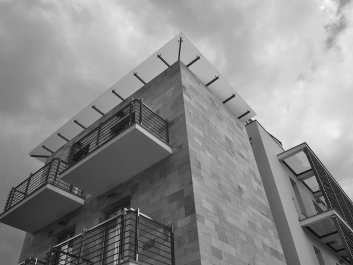 Archisio - Pietro Quatrini - Progetto E d i f i c i o p o l i f u n z i o n a l e