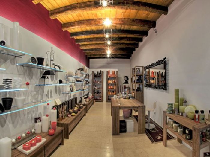 Archisio - Dario Poles - Progetto Interior design negozio candele trento