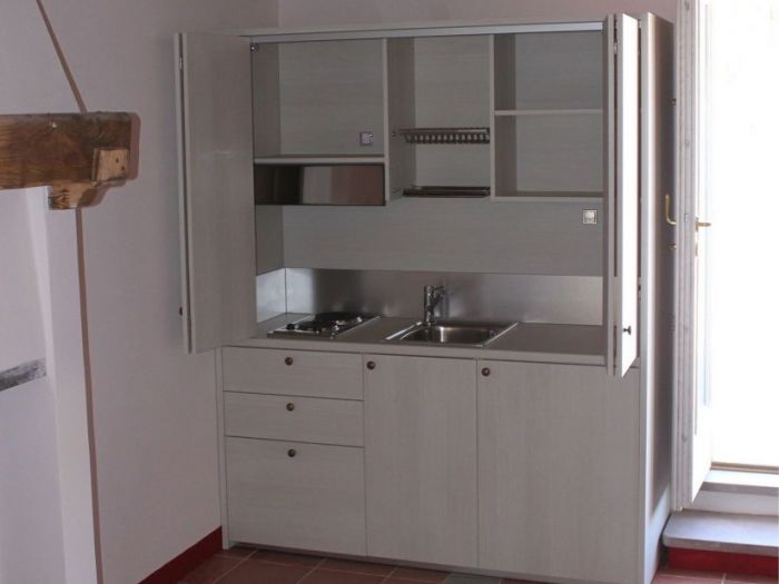 Archisio - Sizedesign Smart Kitchens Living - Progetto Cucine e mini cucine monoblocco a scomparsa