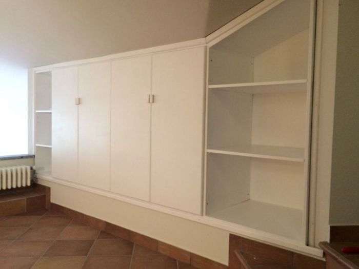 Archisio - Magnolialab - Progetto Mobili in legno masselo