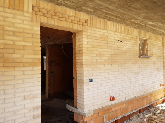 Archisio - Impresa Sharon Srls - Progetto Appartamentiville lavorazione mattoni faccia a vista e rivestimenti in pietra