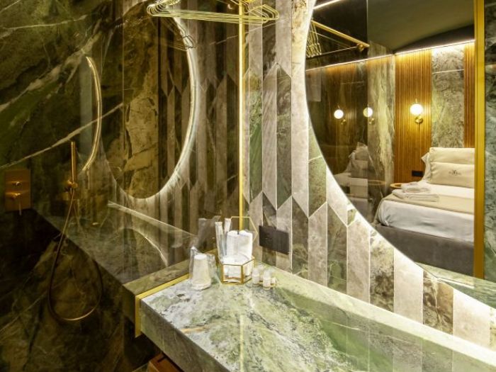 Archisio - Salvatore Sito - Progetto riflessi di marmo e ottone