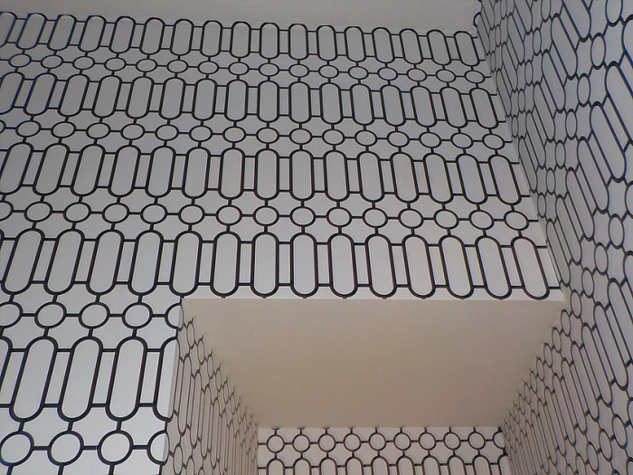 Archisio - Annalisa Cerre - Progetto Ingresso con carta da parati moderna