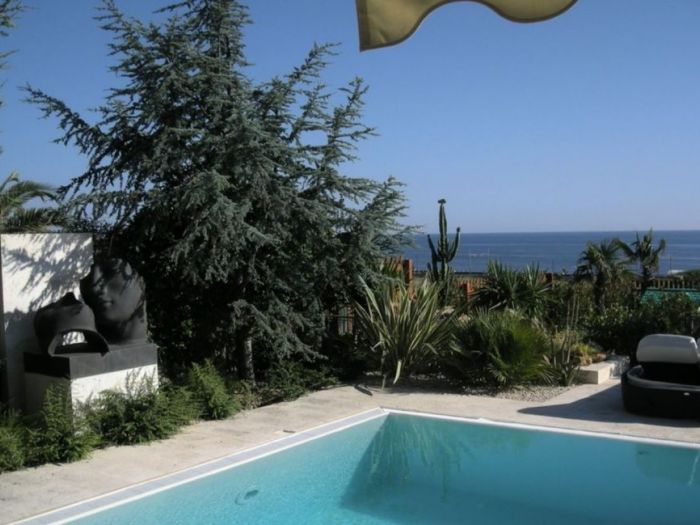 Archisio - Tiziana Galosi - Progetto Progettazione piscina e giardino di una villetta