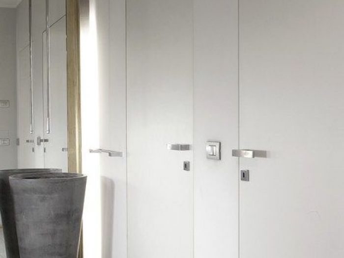 Archisio - Ivo Mare - Progetto Porte per interni