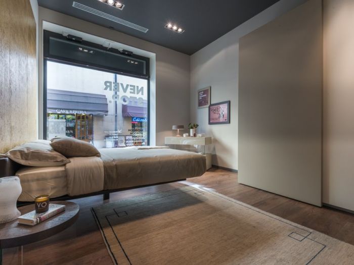 Archisio - Studio Fotografico Francesco Degli Innocenti - Progetto Lago store rimini