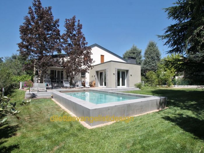 Archisio - Diletta Evangelisti - Progetto Restyling di villetta con aumento di volume e nuova piscina