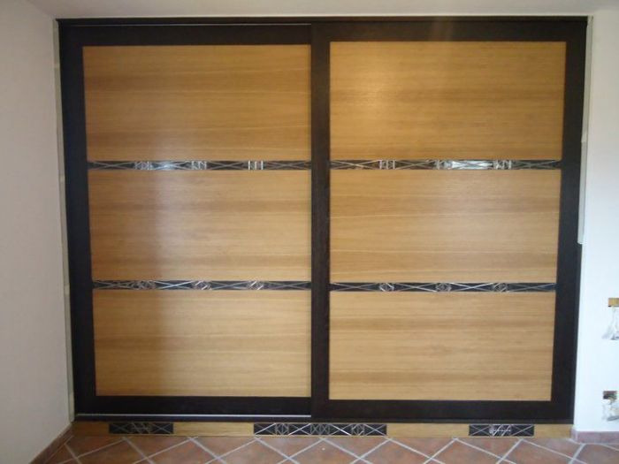 Archisio - Falegnameria Sardano Demurtas - Progetto Armadio ante scorrevoli in legno rovere