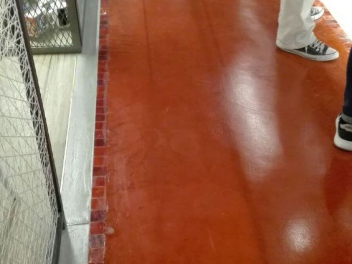 Archisio - Dekotec srl - Progetto Rivestimento in cemento spatolato in un bar a osimo