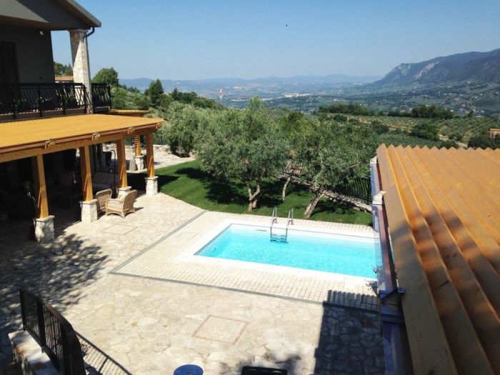 Archisio - Zanzotti Srls - Progetto Progettazione e realizzazione di pergolato a misura in legno lamellare in villa privata