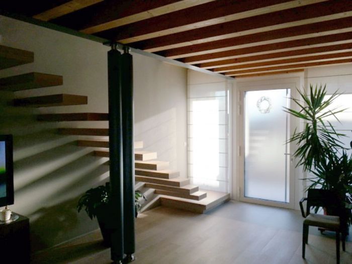 Archisio - Giorgio Mauro - Progetto Progetto di una casa a schiera per tre unit abitative