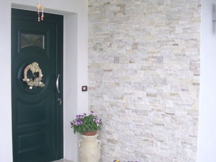 Archisio - Bertolani Pavimenti - Progetto Rivestimento in pietra naturale quarzite white