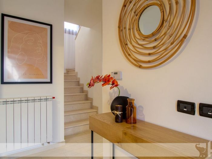 Archisio - Elisa Cattelan - Progetto Da una parete arancione ad uno stile etnic chic