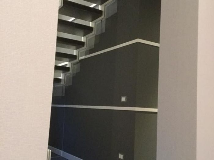 Archisio - Decora srl - Progetto Design scala interna