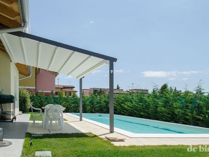Archisio - De Biasi Tendaggi - Progetto Outdoor con piscina