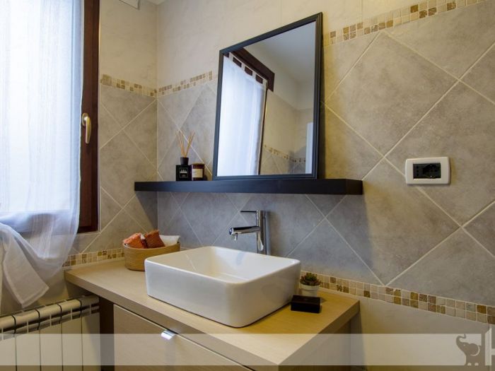 Archisio - Elisa Cattelan - Progetto Da una parete arancione ad uno stile etnic chic