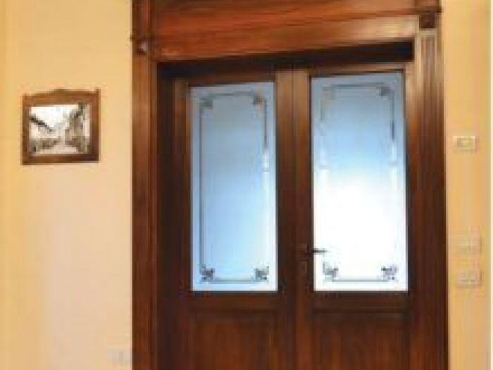 Archisio - Legno Point - Progetto Porte interne e portoni