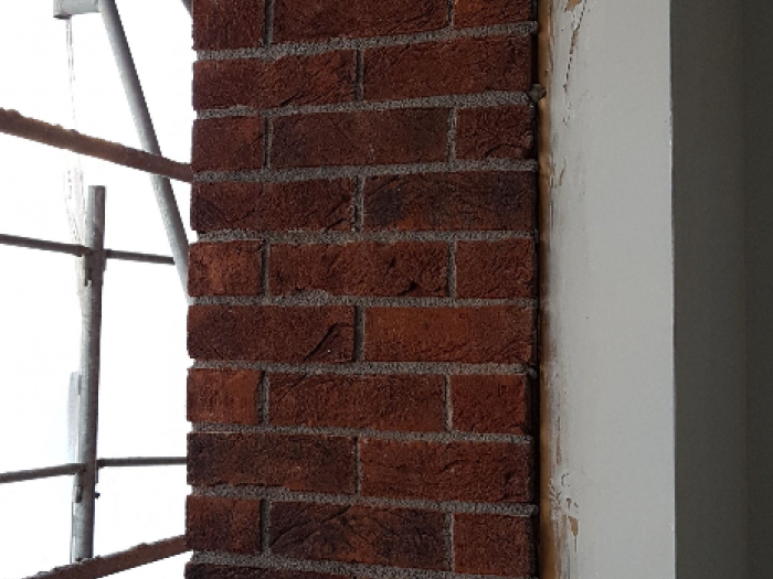 Archisio - Impresa Sharon Srls - Progetto Appartamentiville lavorazione mattoni faccia a vista e rivestimenti in pietra