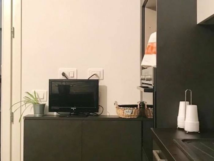 Archisio - Loft Arredamenti - Progetto Arredamenti cucine e soggiorni