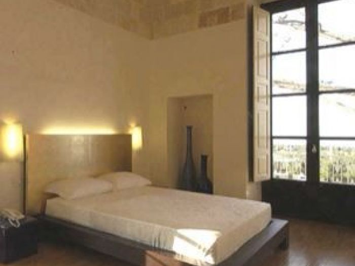 Archisio - Francesco Ruffini - Progetto Progetto direzione lavori e arredamento di un hotel prestigioso a ridosso della nota costa rocciosa di polignano a mare realizzato dagli architetti francesco ruffini e margherita quinto