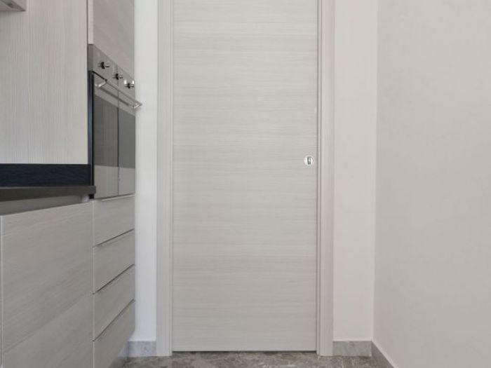 Archisio - Falegnamo - Progetto Porte su misura